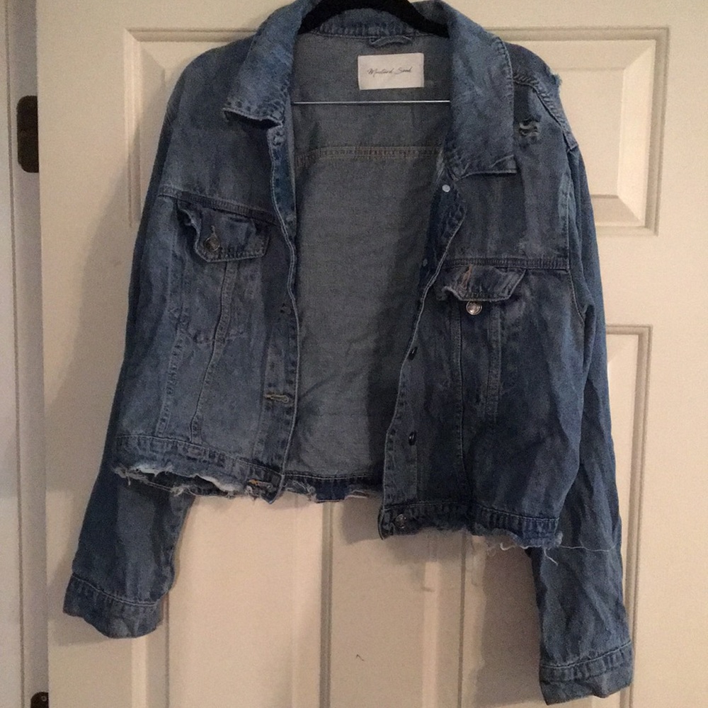Cropped jean jacket with rips